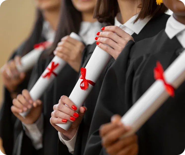 Graduates with diplomas